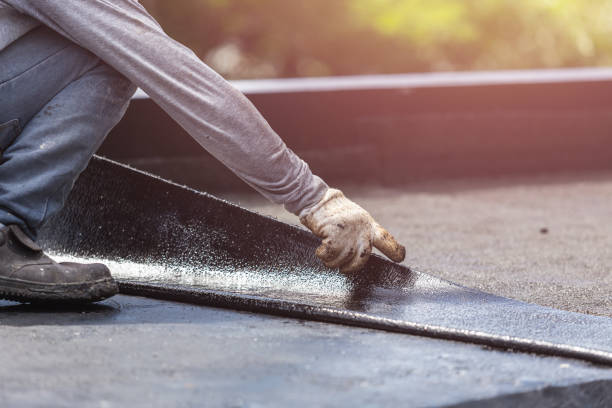 Professional Basement Waterproofing technician working in Alexandria, MN